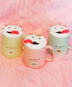 taza con tapa y cuchara lengua